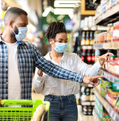 Couple shopping together in grocery store
