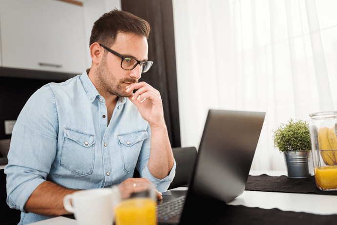 man using laptop computer
